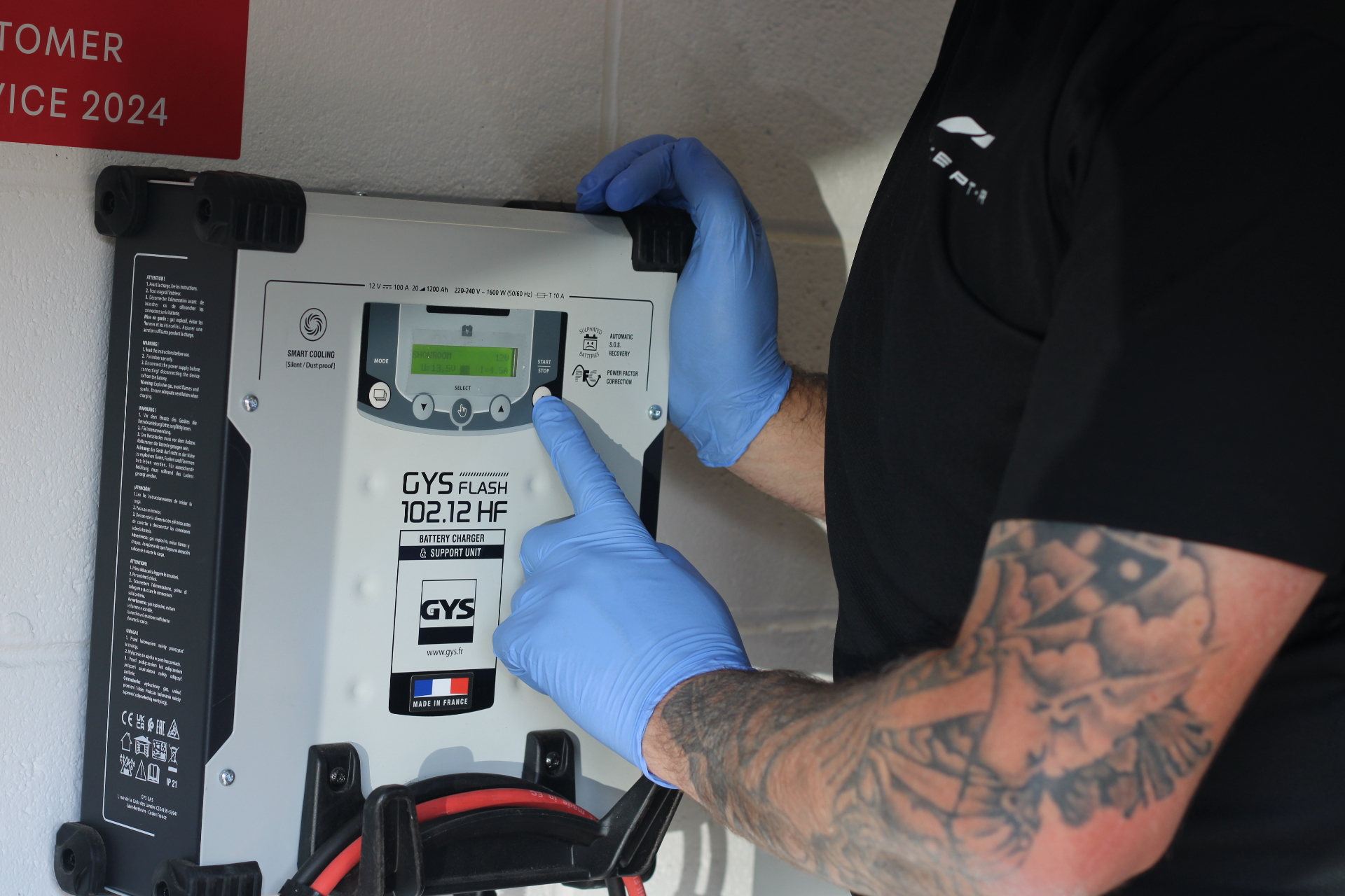 GYS professional battery charger in workshop